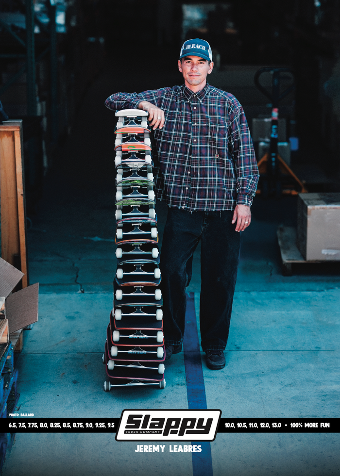 Jeremy Leabres with a stack of Slappy trucks - Slappy Truck Company